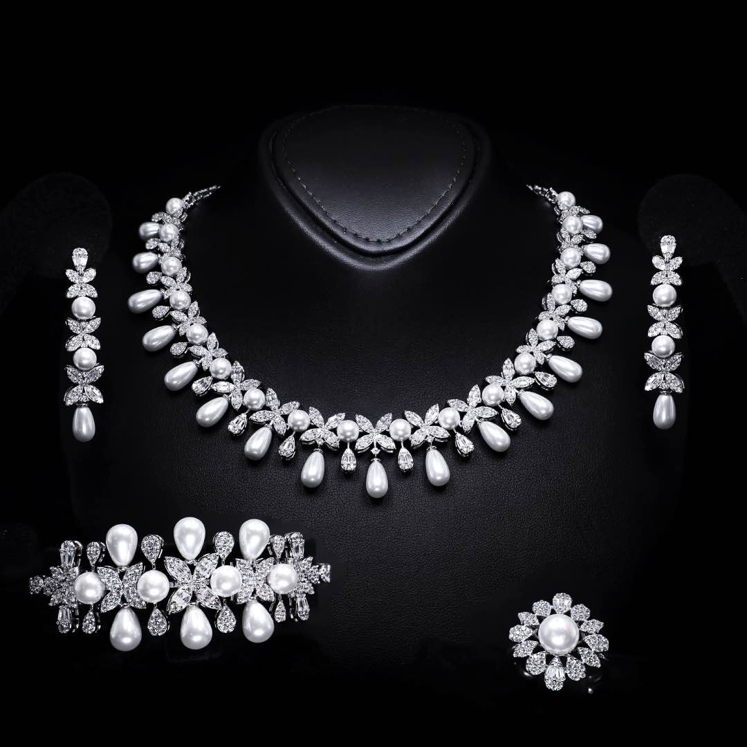طقم زفاف أمنية شولاي الكامل باللؤلؤ وأحجار الزركون عالية الجودة مطلي بالروديوم