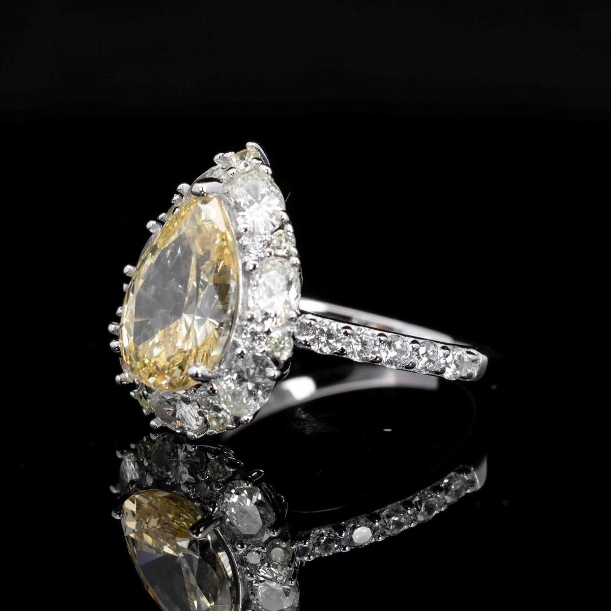 Sireesha Yellow Pear Cut Ring in 925 Silver With High Quality Simulated Diamonds