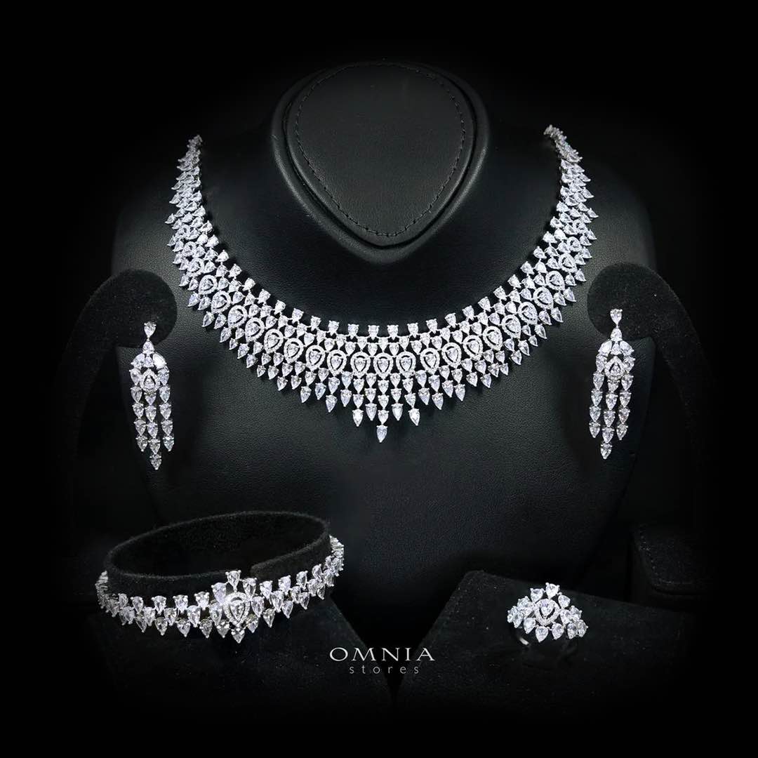 Omnia Alexa rhodium-plated bridal jewellery set with white zircon stones, including necklace, earrings, bracelet and ring
