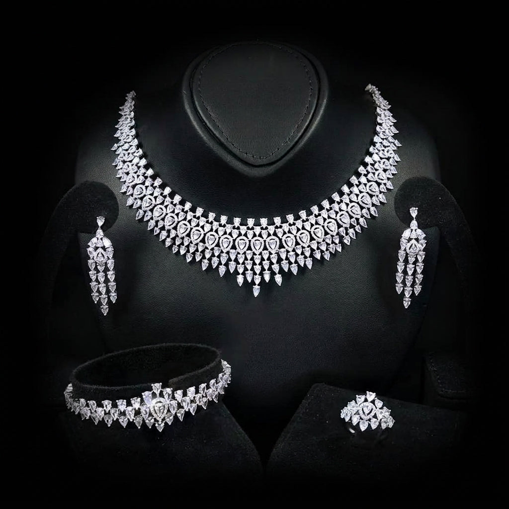 Omnia Alexa rhodium-plated bridal jewellery set with white zircon stones, including necklace, earrings, bracelet and ring