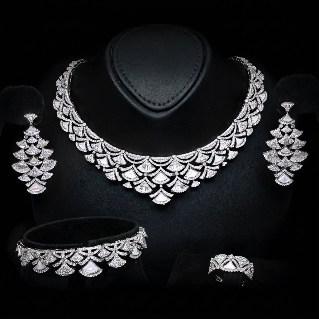 Omnia Bita rhodium-plated bridal jewellery set with white zircon stones, including necklace, earrings, bracelet and ring