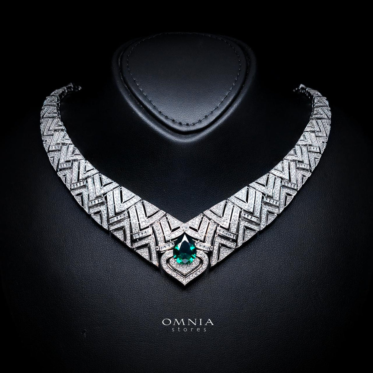 Omnia Daryan bridal necklace with geometric detailing and a green teardrop-shaped zircon centre stone
