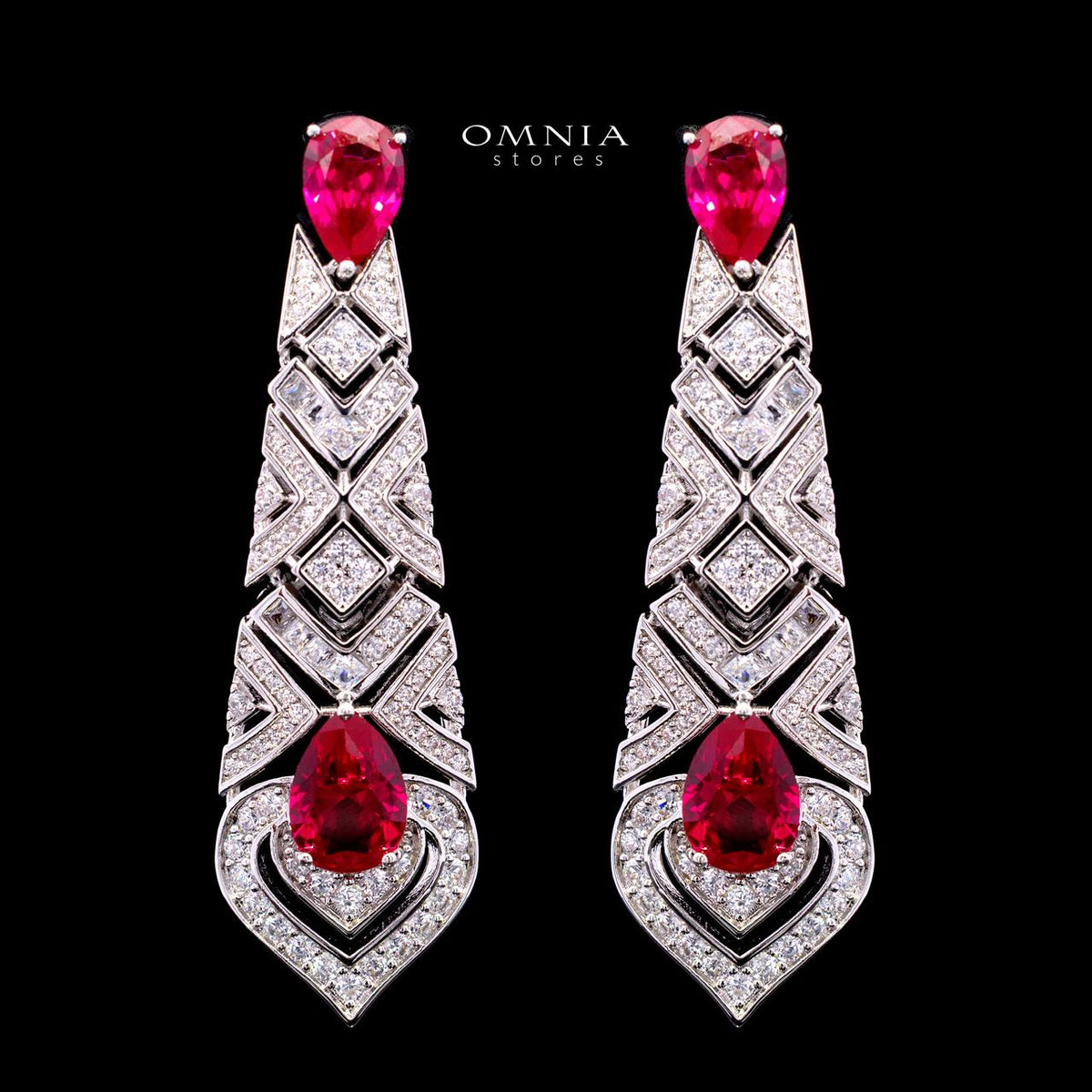 Omnia Daryan long bridal drop earrings with geometric detailing and red zircon accents