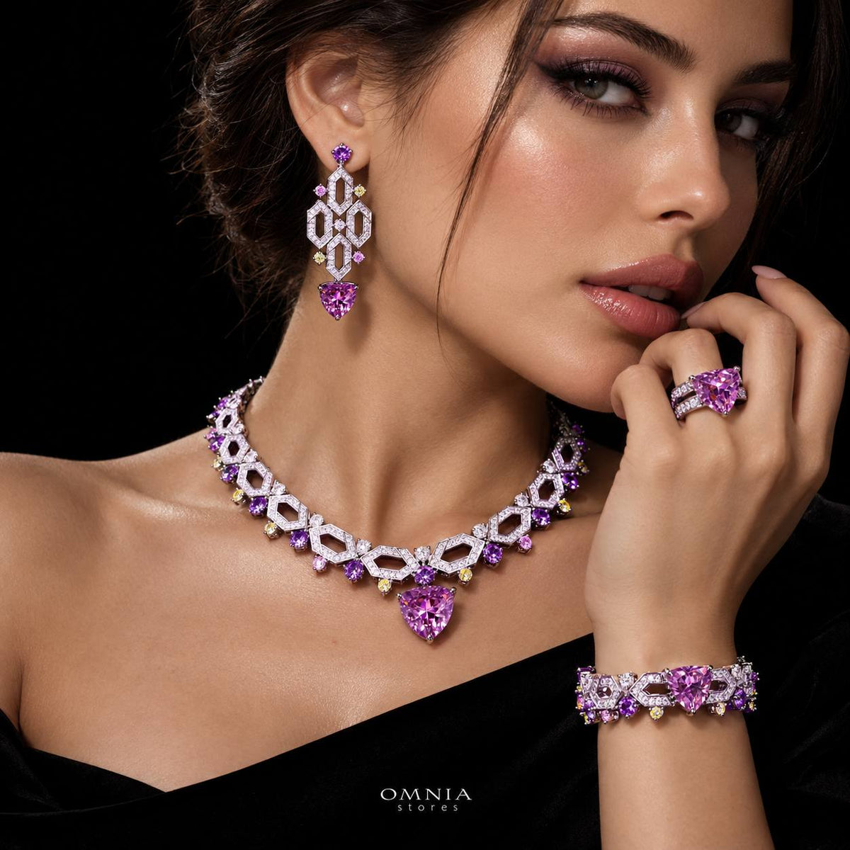 Model wearing the Omnia Elissa multicolor zircon bridal jewellery set with necklace, earrings, bracelet and ring