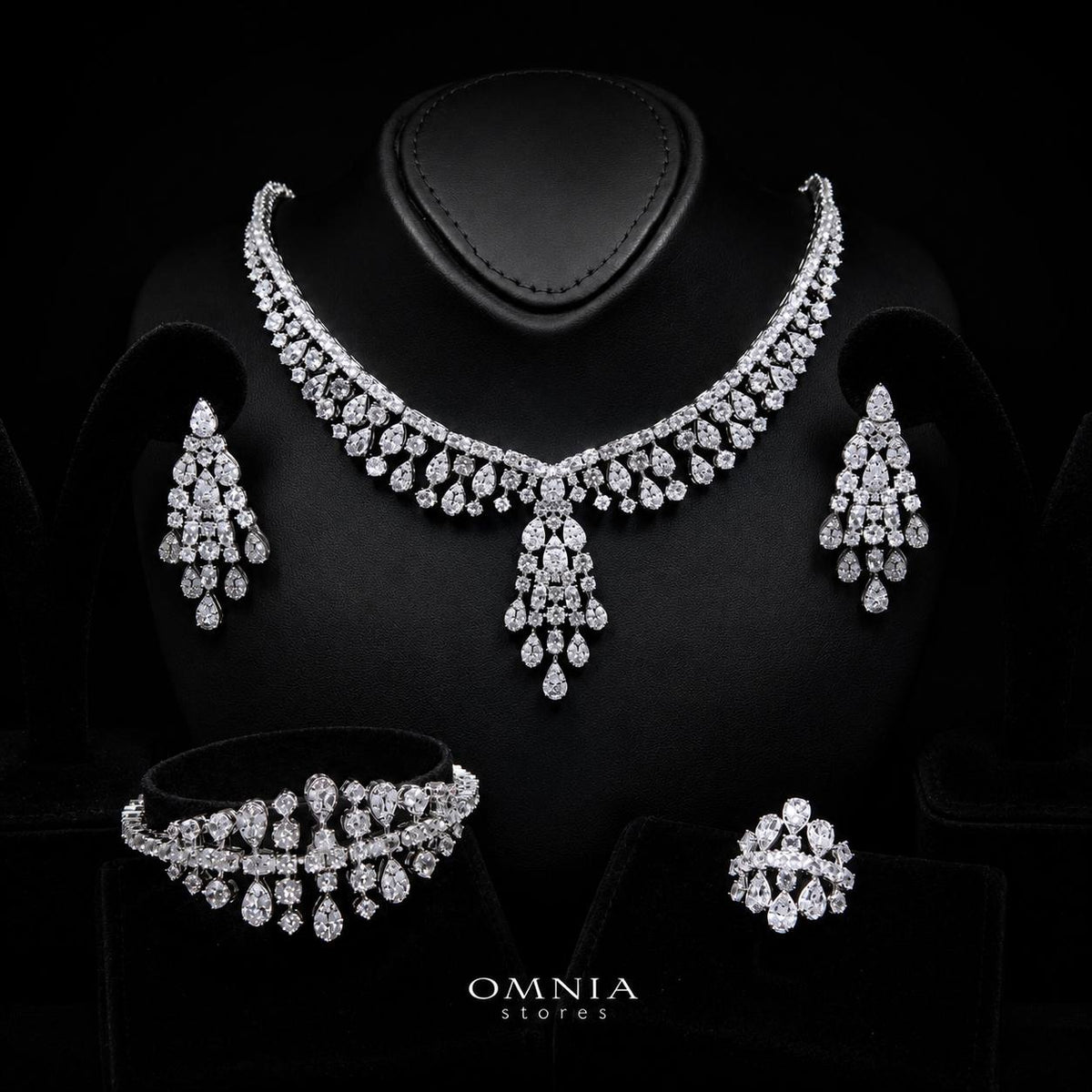 Omnia Minerva rhodium-plated bridal jewellery set with clear zircon stones, including necklace, earrings, bracelet and ring