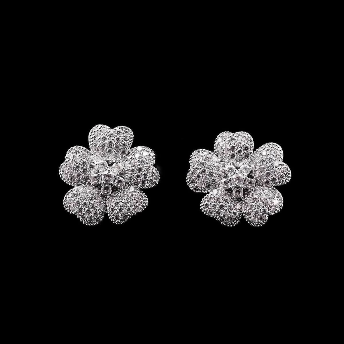 Omnia Lamis Silver Floral Earrings with Textured Petals and Pave-Set High-Quality Zircon Stones in a Rhodium Plated Finish - OMNIASTORES UAE