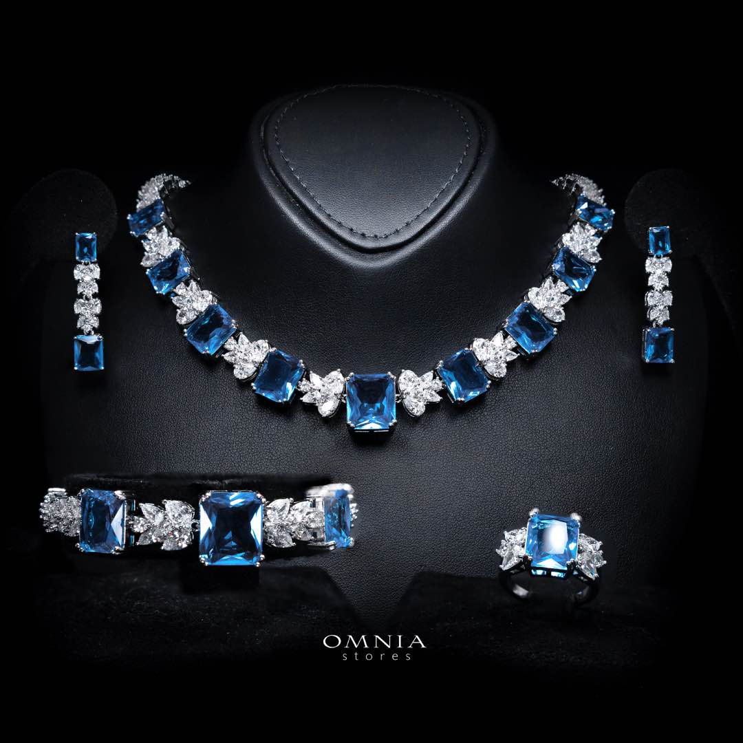 Omnia Amelia Sky Blue Bridal Full Set with Emerald and Pear-Cut High-Quality Simulated Diamonds Premium Rhodium Plated - OMNIASTORES UAE