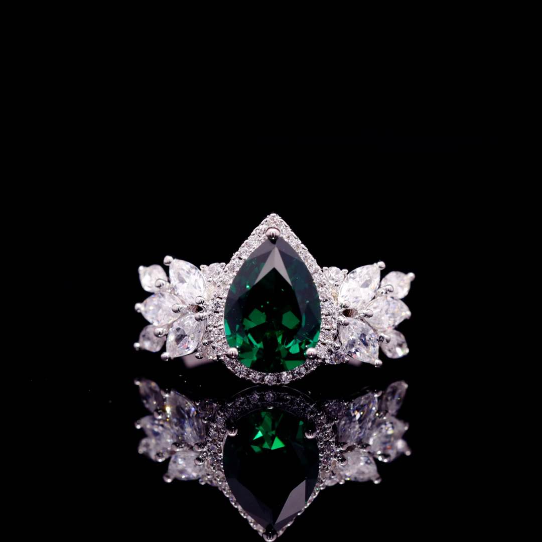 طقم عرائس كامل بتصميم الدمعة أمنية Aamira باللون الزمردي الأخضر والكريستال مع أحجار الزركون عالية الجودة بطلاء الروديوم