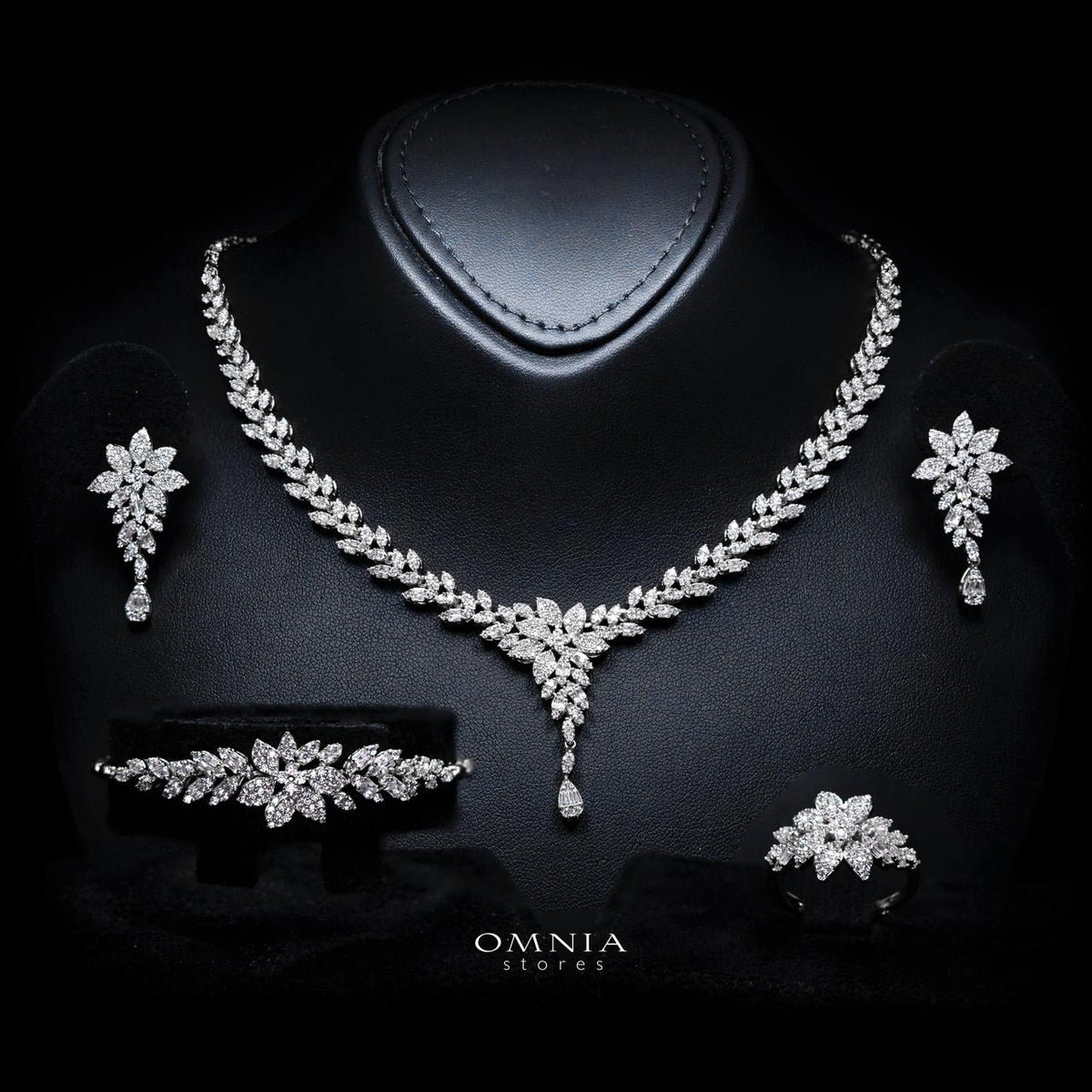 Omnia Farrah rhodium-plated bridal jewellery set with white zircon stones, including necklace, earrings, bracelet and ring