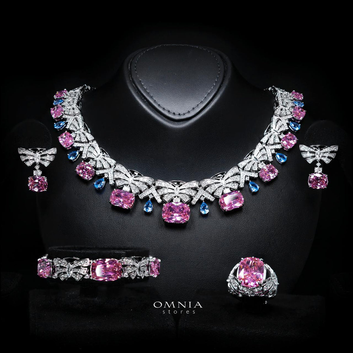 Omnia Kenzy rhodium-plated bridal jewellery set with multicolor zircon stones, including necklace, earrings, bracelet and ring