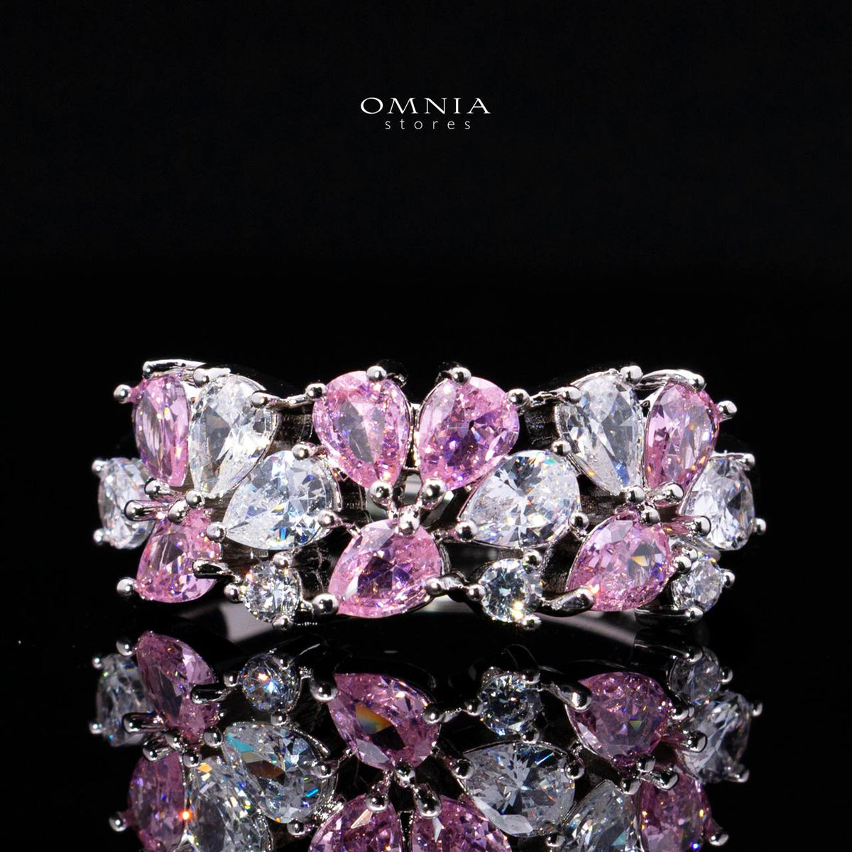 Omnia Safira wide bridal ring with pink and clear zircon stones in a floral cluster design