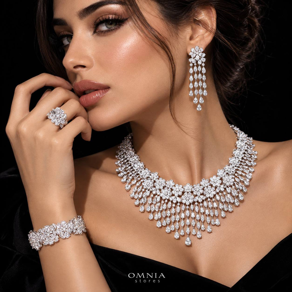 Model wearing the Omnia Seema White bridal jewellery set with zircon stones and rhodium plating