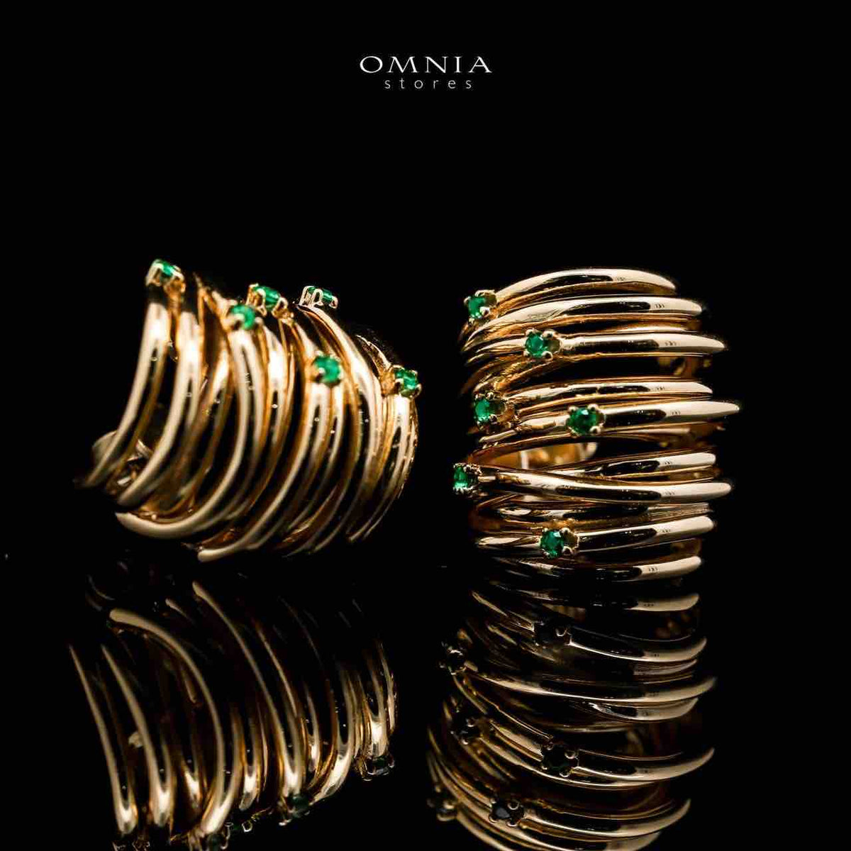 Omnia Dhuriyyah Golden Spiral Stud Earrings in 925 Silver with High-Quality Green Simulated Diamonds - OMNIASTORES UAE