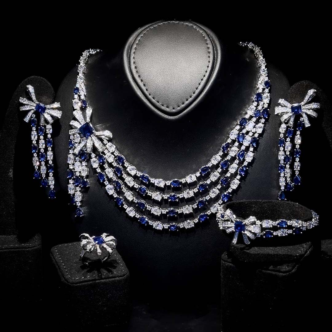 Omnia Mawada Blue Bridal Full Set with Elegant Bow-Accent Design and High-Quality Zircon Stones in Rhodium Plated Finish(size 18 only available in ksa)