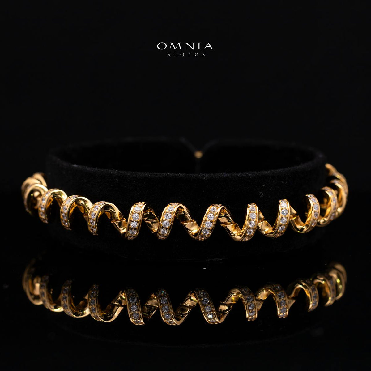 Maristela Spiral Ribbon Twist Gold-Plated Bracelet with Premium Simulated Diamonds in 925 Sterling Silver
