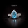 Omnia Layal Pear Shaped Sky Blue Ring in 92.5 Silver with High Quality Simulated Diamonds