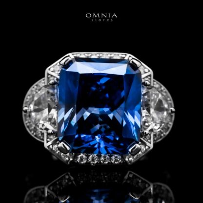 Omnia Sadeen Emerald Cut Sapphire Blue Ring in 92.5 Silver with High Quality Simulated Diamonds
