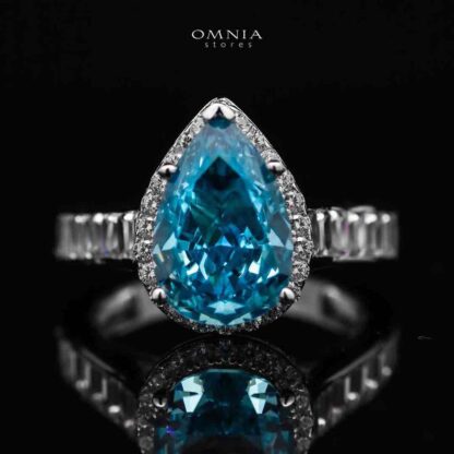 Omnia Layal Pear Shaped Sky Blue Ring in 92.5 Silver with High Quality Simulated Diamonds