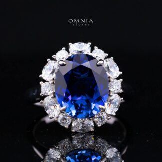 Khloe Blue Lab-Grown Sapphire Ring with GRC Certificate, Oval 10×12mm, in 925 Sterling Silver – Classic Halo Cluster